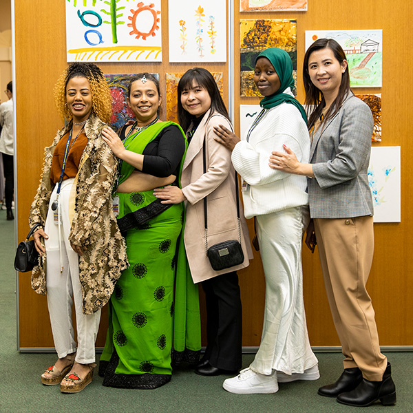 A group of multicultural women at our stories from the pandemic exhibition